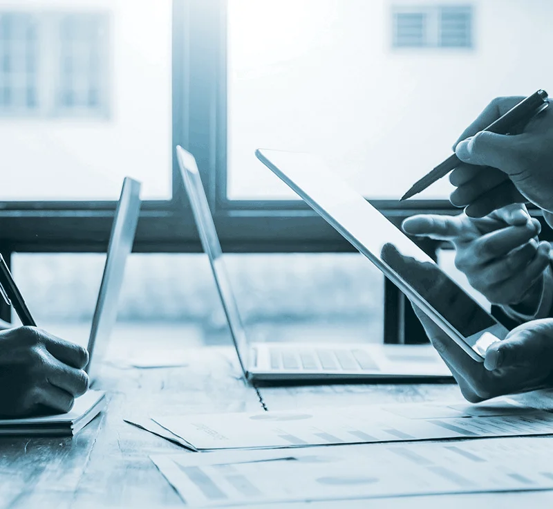 People using laptops and tablet