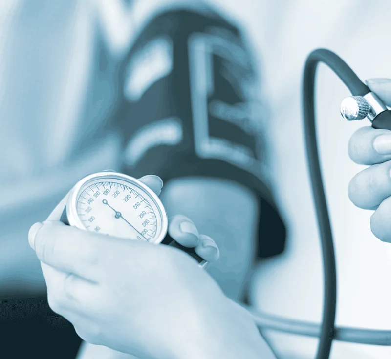 Close up of doctor checking blood pressure
