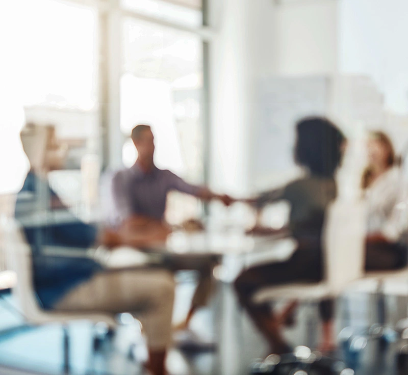 Blurry meeting conference room through glass