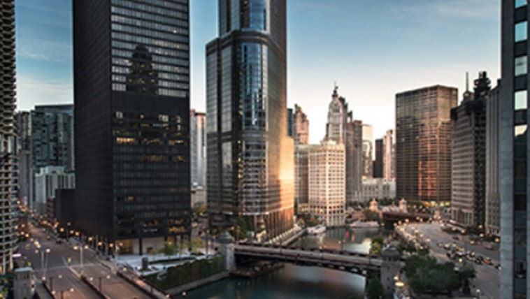 City skyline with a variety of buildings under a clear sky
